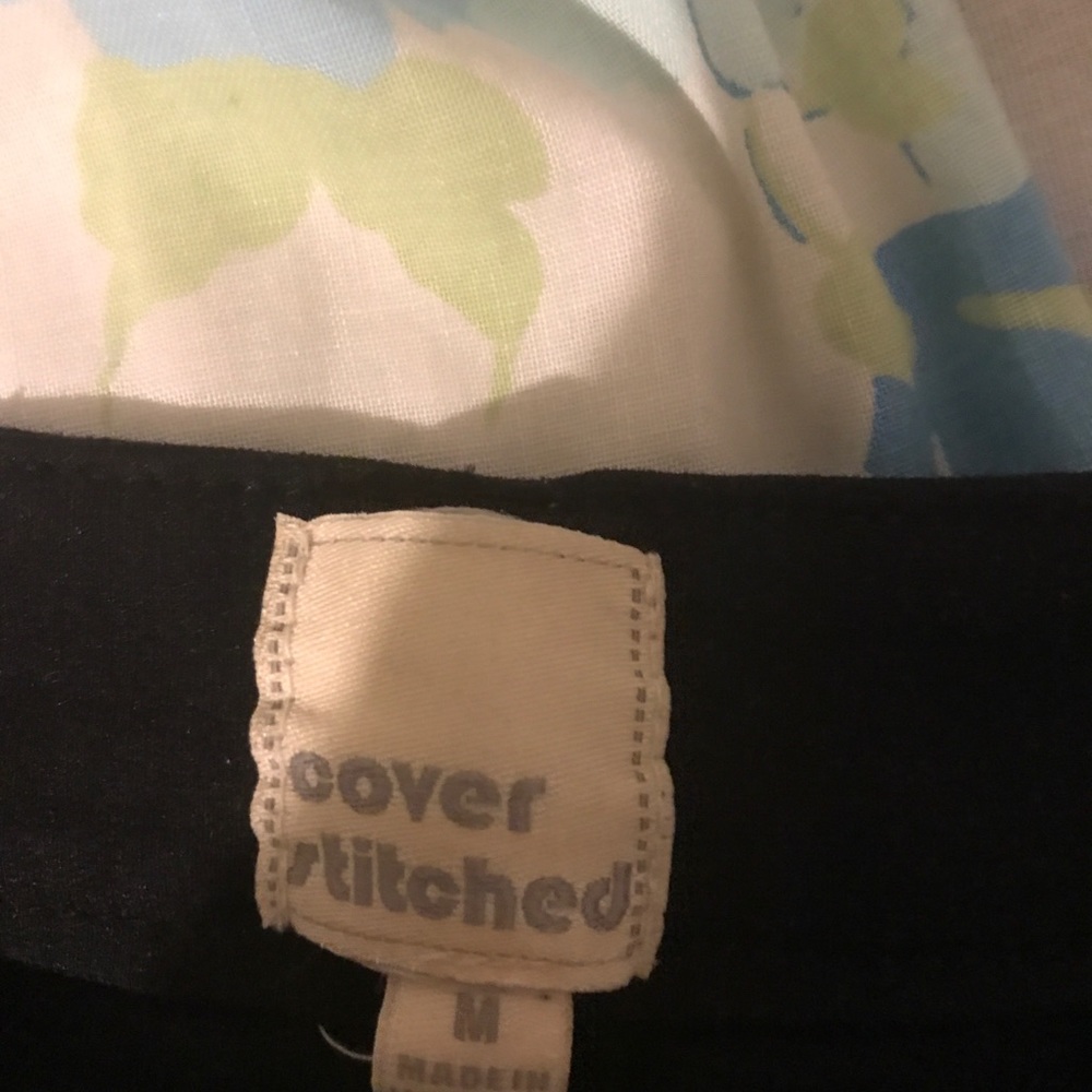 Cover stitched black jeans